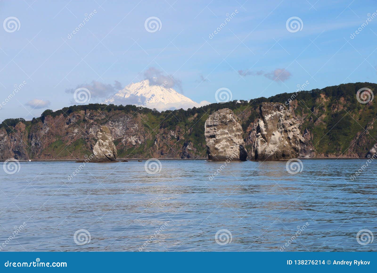 view of tri brata with koryaksky volcano`s top in the background